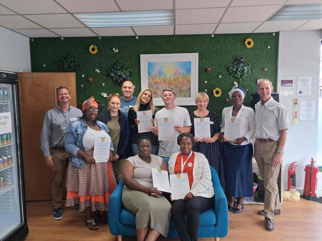 Team at Unicare receiving their Kit4Care certificates