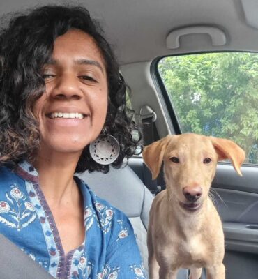 Anjali Moorthy in care with dog