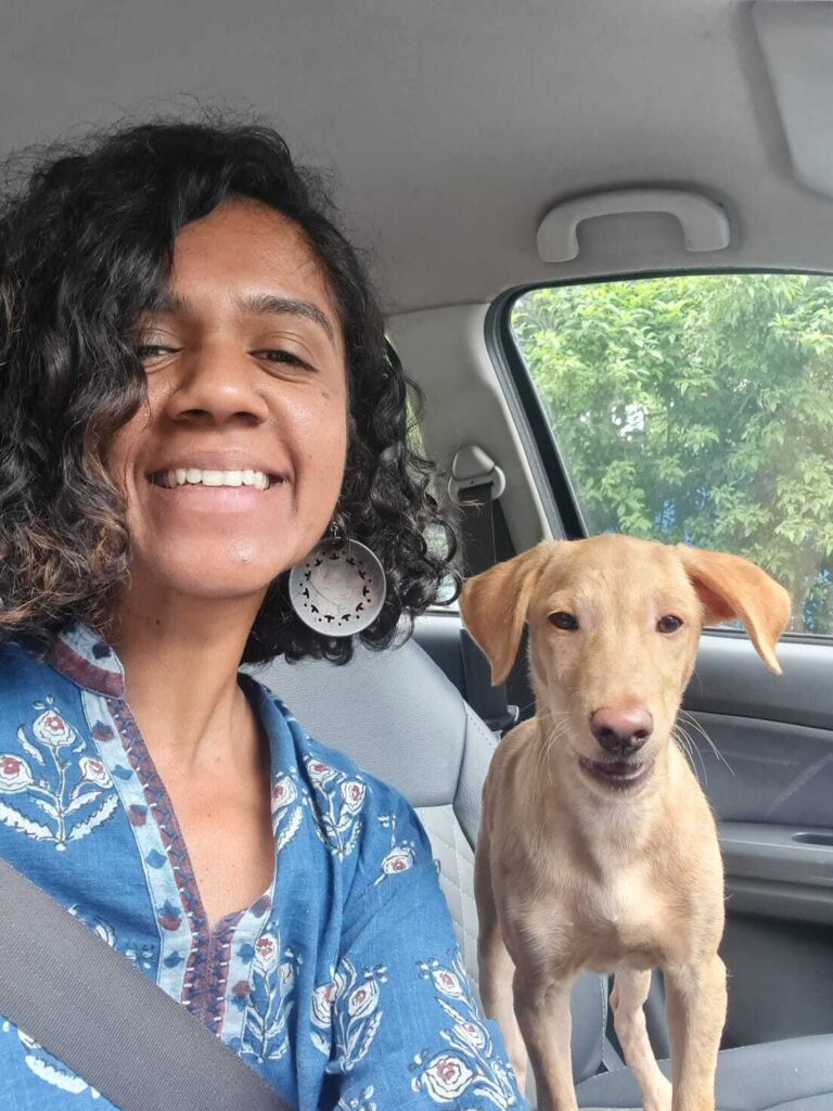 Anjali Moorthy in care with dog