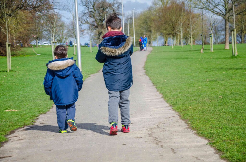 Children walking along the River Roding